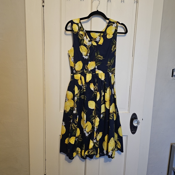 Rockabilly Swing Dress In Lemon Print On Navy With Belt. - Picture 2 of 2